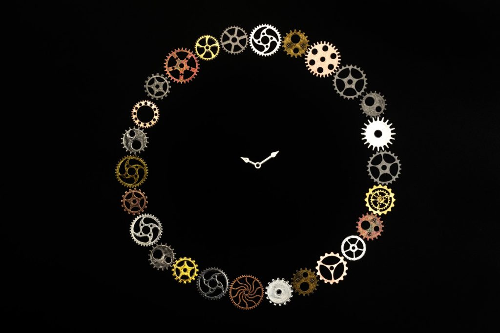 Simple clock made out of little cogwheels.
